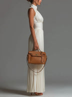 Abigail | V-Hals Ærmeløs Jumpsuit i Chiffon med Vide Ben