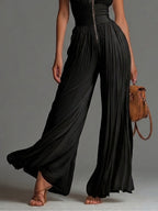 Abigail | V-Hals Ærmeløs Jumpsuit i Chiffon med Vide Ben